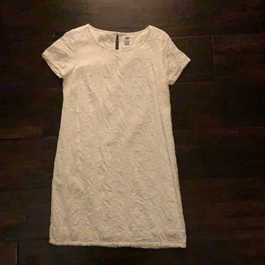 White dress. Top of shoulder to bottom edge is 33.5”